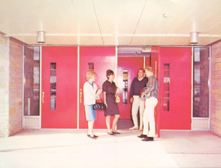 our school, people entering the doors ready for learning